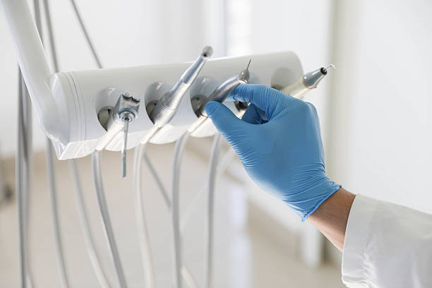 Professional Tooth Extraction technician working in Oxford, KS